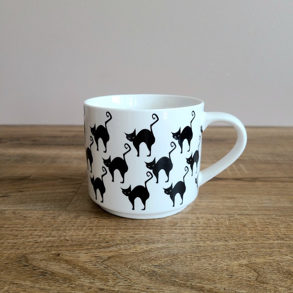 Mug shotz mug with black cats design.